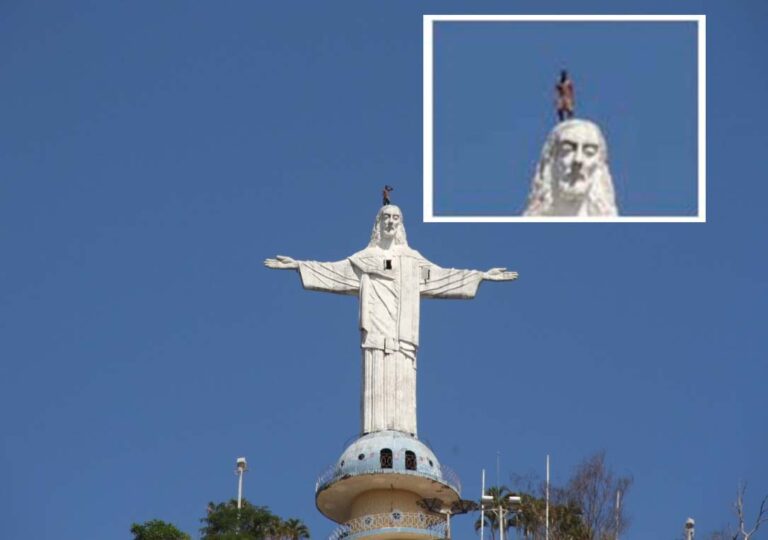 Perigo: homem sobe no topo do Cristo Redentor em Mimoso