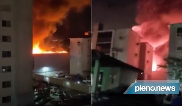 Grande incêndio atinge loja em bairro alagado de Porto Alegre